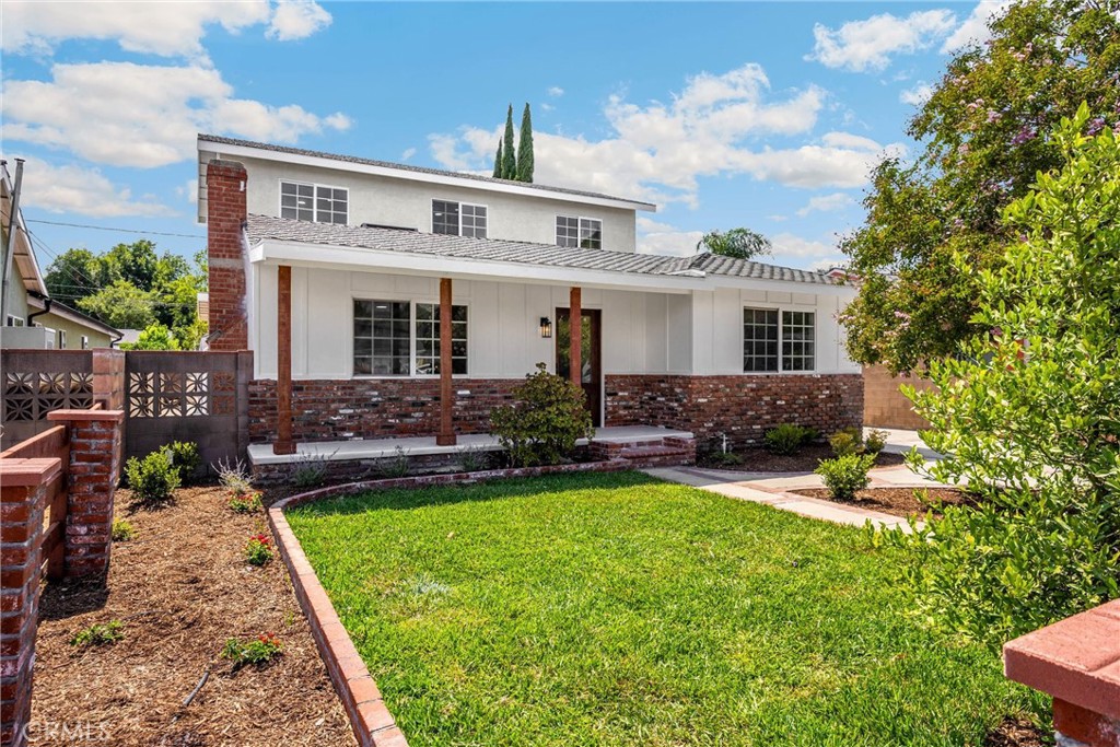 Welcome to 631 Kenwood Ave, a beautifully remodeled home in the heart of Burbank and a top-rated school district! This spacious 5-bedroom, 3-bathroom home blends modern upgrades with a functional layout offering two main-floor bedrooms and three upstairs. Perfect for today’s lifestyle or multi-generational living.
The main level features a luxurious primary suite with double-door entry, walk-in closet, and a fully renovated en-suite bathroom. The primary bath offers both style and function with a walk-in shower, soaking tub, elegant cabinetry, lighted mirrors, and more. Across the hall, you’ll find a second bedroom with a cozy gas fireplace and an adjacent full guest bathroom, ideal for visitors or a flexible home office.
At the heart of the home is a custom kitchen designed for entertaining, showcasing an oversized island with built-in storage and microwave, built-in coffee bar with wine fridge, top-of-the-line Thor appliances, custom white oak soft-close cabinetry, 36” range, dishwasher, and more! Just off the kitchen is a spacious family room and a large formal dining room, perfect for gatherings.
Upstairs, you’ll find three additional bedrooms and a beautifully updated bathroom with a stunning walk-in shower, offering privacy and versatility for family, guests, or work-from-home needs. The property also includes a detached 2-car garage, offering ample storage or potential ADU opportunity (buyer to verify).
Move-in ready and thoughtfully upgraded from top to bottom, this home features custom closet doors, ceiling fans throughout, new luxury vinyl flooring, modern light fixtures, and three fully renovated bathrooms. This elevated space is ready for you to call it home!