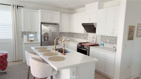 Photo of 426 Lobata, Irvine, CA 92618 (MLS # OC26086643)