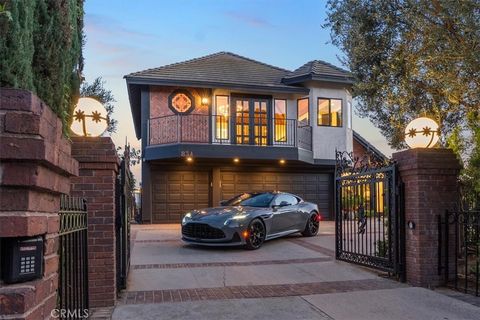 Photo of 834 Moorside Drive, Glendale, CA 91207 (MLS # GD26082017)