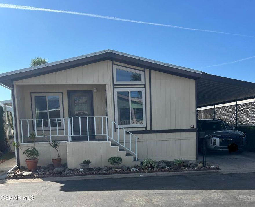 Located in the Ojai Villa Estates (55+) Park, towards the center of the park with easy access to the clubhouse and bike trail. The living room has vaulted ceilings. Newer appliances and flooring in the kitchen with dual-pane windows throughout. The primary bedroom has a very large closet with an attached bathroom. From the front porch, there are beautiful mountain views.  This park requires buyer approval prior to purchase.