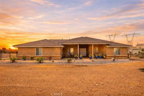 Photo of 6797 Blue Rose Ln, Oak Hills, CA 92344 (MLS # HD26007813)