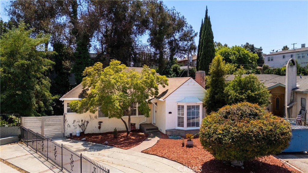 This home is situated in a quiet cul-de-sac in the highly desired Windsor Hills community. The property boasts a 10K+ lot size, which offers ADU potential and other expansion options. You're greeted with a wood burning fireplace in the living room upon entering the front door. A separate, formal dining room is located between the living room and spacious kitchen. The entire interior of the home is newly painted. The 2 bedrooms are both generously sized. In addition, the warm family room is perfect for entertaining or just winding down after a long day. Also, there's a bonus room off the gigantic back yard area that can be used for storage, game or workout room, man cave etc. All of this just minutes from LAX, fine dining, shopping centers, boutiques, parks, schools etc.