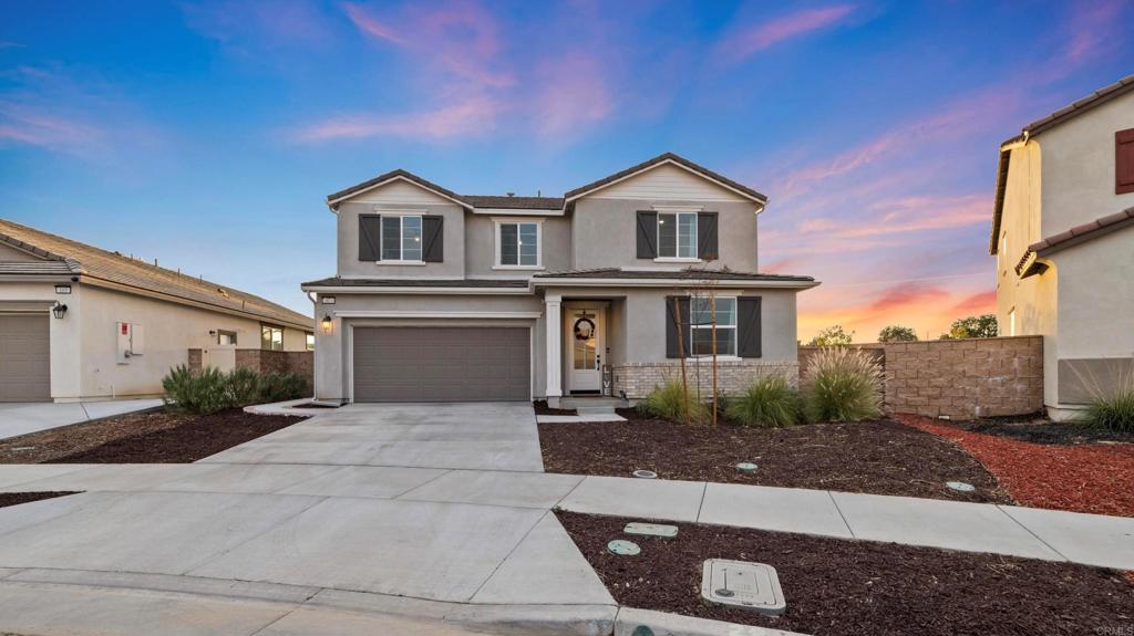 TONS OF UPGRADES NO LONGER AVAILABLE BY THE BUILDER. THIS IS A ONE-OF-A KIND PROPERTY YOU WON'T FIND ANYWHERE ELSE. Where LUXURY meets Hemet. Welcome to this newly built home situated on the largest lot in the neighborhood! Thoughtfully designed with an impressive array of upgrades, this home offers the perfect blend of luxury, comfort and functionality. The spacious floor plan features a stunning kitchen with upgraded soft-close cabinets, granite countertops, a farmhouse sink, high-end appliances and walk-in pantry. The main floor also includes a bonus room with double doors (perfect for a home office or playroom), and an oversized bedroom with a walk-in closet and a full bathroom, while a mudroom conveniently connects the kitchen to the garage. Upstairs, you’ll find a generous loft, a spacious primary suite with a massive walk-in closet, 3 additional well-sized bedrooms and another full bath. The interior showcases upgraded bathrooms, stylish doors, blackout blinds in all bedrooms and a stunning $7k upgraded stair railing. This property is packed with conveniences, including a two-car garage with ceiling storage racks, a soft water system, a water filtration system with UV light, zoned AC for upstairs and downstairs and a tankless water heater for energy efficiency. The backyard is an entertainer’s paradise, featuring upgraded turf with proper drainage, irrigation for plants and a gas fire pit with seating area. Best of all, the solar panels are fully paid off and owned, providing ongoing energy savings. Enjoy access to multiple community parks, a pool, hot tub, gym, trails, and more, all within walking distance. Conveniently located on the Temecula/Winchester border near top-rated schools, shopping, and dining, this home has it all!