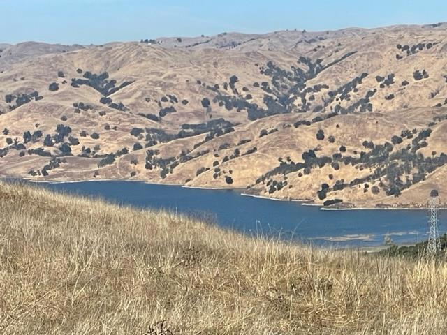 Build your own estate amongst other multi-million dollar homes and world class wineries. Beautiful and quiet location, only minutes to Interstate Highway 680 and other transportation routes. Short drive to downtown Milpitas. Exceptional 18.65 acres plot of land with wonderful views of the one side and gorgeous views of Calaveras Reservoir on the other side. This parcel has a great site for a home that can take advantage of both views. There is electricity and a shared water well onsite. For navigation purposes, the entrance to the property is across the street from 5002 Felter Road.