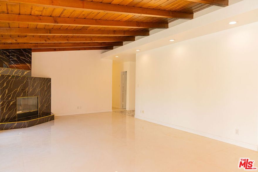 Welcome to this lovely remodeled single-story home featuring 3 bright bedrooms, and 2 luxury style bathrooms. Beautifully designed kitchen with new appliances. Breathtaking huge back yard with refreshing large in ground pool. 2 car detached garage with alley access point for entry. This home conveniently located close to El Camino high school, Calabasas, and Westfield Topanga Villag. Extraordinary opportunity to live in this dream home. The home's layout offers both functionality and style, ideal for today's lifestyle.