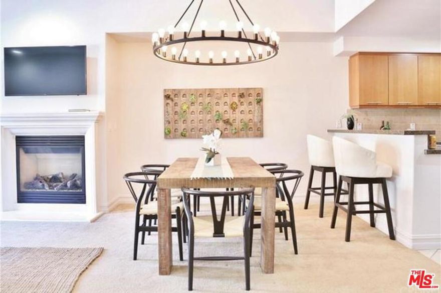 Warm and inviting luxury 3 bedroom 3 bathroom unit centrally located in the heart of Sherman Oaks! With over 1,790 square feet of living space, this fantastic single-family alternative townhome is fully loaded: an open concept floor plan ideal for entertaining and relaxation, high ceilings, recessed lighting, in-unit laundry, fireplace and glass doors opening to a terrace. Granite countertops, sleek custom cabinetry, a breakfast bar and stainless steel appliances are featured in the cooks kitchen. Filled with natural light, the sky-lit staircase leads to the spacious master suite with vaulted ceilings, a walk-in closet, tranquil private terrace, and luxury master bathroom equipped with a dual-sink vanity, glass shower and spa tub. Ideally positioned close to the Sherman Oaks Galleria, you are just minutes to top level shopping, restaurants and entertainment. Welcome home!