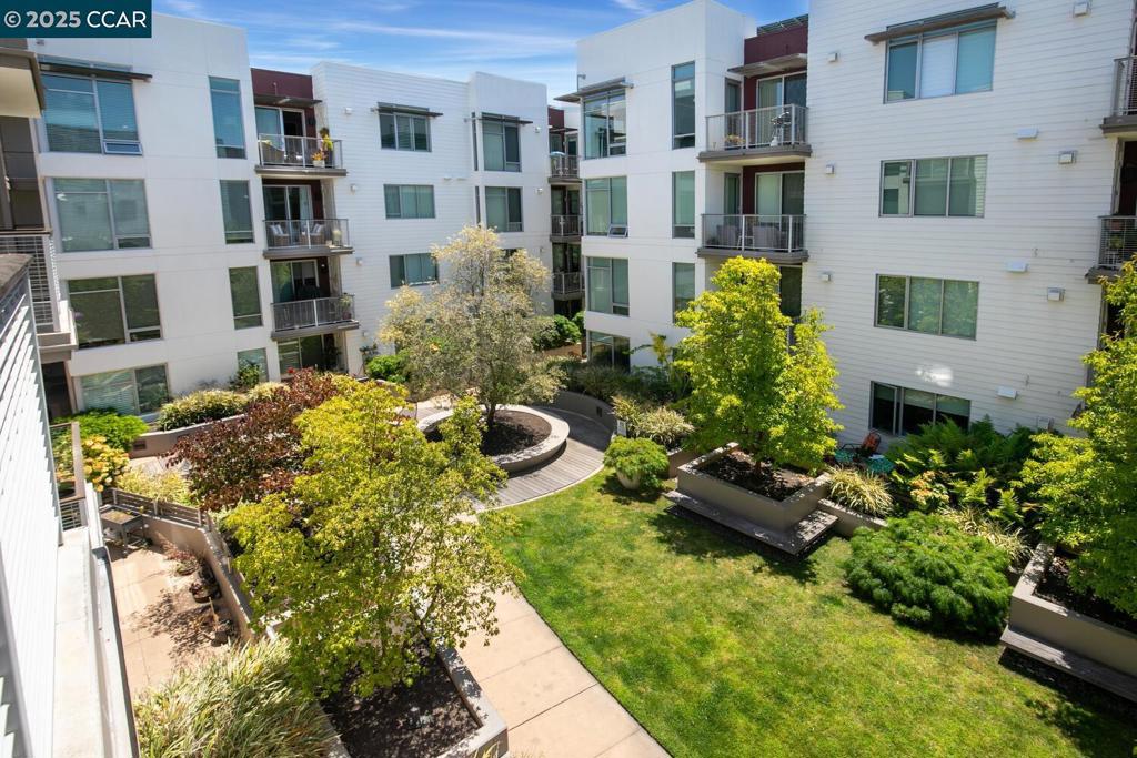 Experience luxury living in downtown Walnut Creek! This spacious 1-bedroom, 1-bath contemporary condo boasts an open floor plan with floor-to-ceiling windows and hardwood floors. The sleek kitchen is equipped with European cabinetry, stainless steel appliances, and quartz countertops. The primary bedroom features a walk-in closet and a balcony overlooking the courtyard. Enjoy the convenience of an in-unit laundry with a front-load washer and dryer. One reserved parking spot, along with additional storage, is available in the secure underground garage. The building offers an array of upscale amenities, including a rooftop sky lounge with BBQs, a fireplace, and breathtaking views of Mt. Diablo; a renovated fitness center; and a media room. With secure entry, two elevators, and a garden-like courtyard, this home blends city living with suburban comfort—just minutes from dining, shopping, trails, top-rated schools, BART, and easy access to HWY 24/680.
