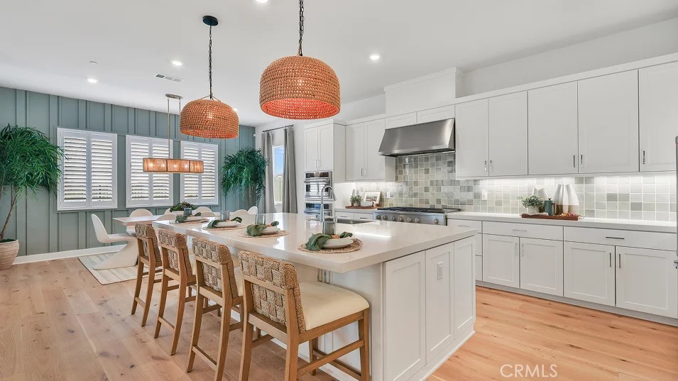 This expansive two-story home offers plenty of space with a total of 4 bedrooms with one of the bedrooms located downstairs with its own private bathroom. The first floor also offers a mud room. The rest of the first floor features an open layout from the modern kitchen that offers white cabinetry throughout, massive walk in pantry. The family room opens to a covered California Room ideal for indoor-outdoor living. The second floor hosts a laundry room along with three more bedrooms. The luxe owner's suite has a large walk in closet.