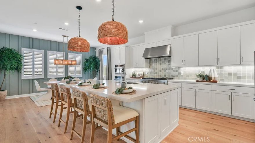 This expansive two-story home offers plenty of space with a total of 4 bedrooms with one of the bedrooms located downstairs with its own private bathroom. The first floor also offers a mud room. The rest of the first floor features an open layout from the modern kitchen that offers white cabinetry throughout, massive walk in pantry.  The family room opens to a covered California Room ideal for indoor-outdoor living.   The second floor hosts a laundry room along with three more bedrooms. The luxe owner's suite has a large walk in closet.