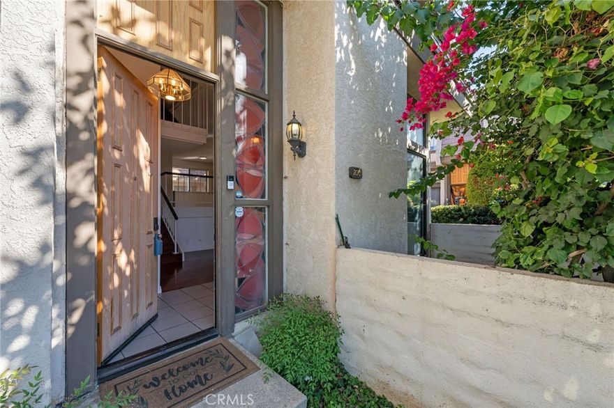 Recently Renovated Corner Unit in the Best Location of Northbrooke! This beautifully updated townhome is perfectly positioned in one of the most desirable and private locations within the Northbrooke community. As a coveted corner unit, it offers maximum privacy, abundant natural light from oversized windows, and serene views of the lush, manicured landscaping. Inside, you'll find a thoughtfully renovated interior, featuring remodeled bathrooms and an upgraded kitchen with newer appliances, fresh countertops, and ample cabinetry. The spacious living room boasts dramatic two-story ceilings, floor-to-ceiling windows, recessed lighting, and a cozy fireplace that opens to your private patio ideal for relaxing or entertaining. The second level includes a formal dining area with a wet bar and a bright kitchen that opens to a casual dining space. A newly remodeled powder room with modern finishes completes the main living area. Upstairs, enjoy three well-sized bedrooms, including a spacious primary suite with a walk-in closet and a fresh, updated look that enhances both comfort and style. unit has brand new installed HVAC system.  Northbrooke offers a resort-style lifestyle with three spas, a large pool, two tennis courts, and peaceful brooks winding through beautifully landscaped grounds. Water, trash, and building insurance are included in the HOA for added convenience. Ideally located near Northridge Fashion Center, Costco, and other major shopping and grocery destinations.

This turnkey home blends modern upgrades with timeless appeal schedule your private tour today!