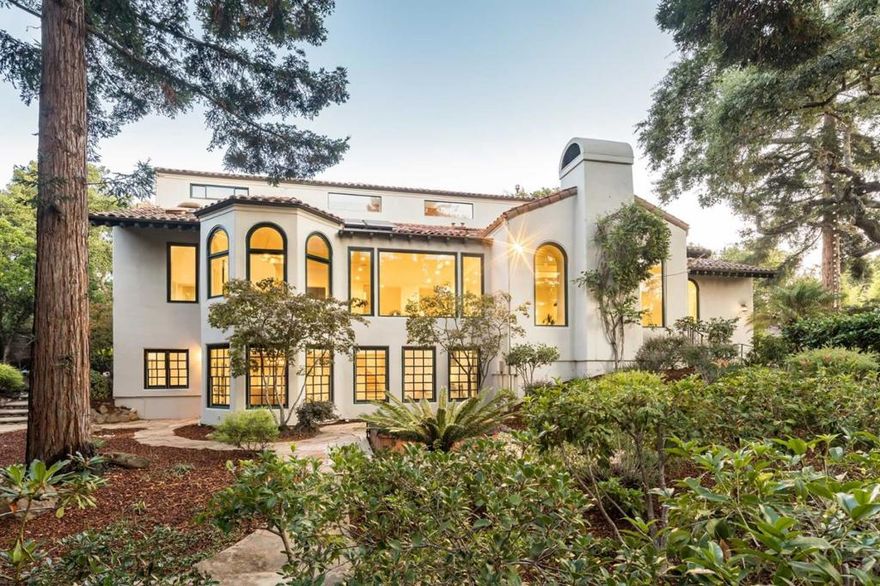 In a bucolic oasis in prime Palo Alto, this newly remodeled, expanded, custom estate blends timeless Spanish style with the very best of modern luxury. Offering 6 bedrooms and 4.5 baths across 6,282 sq. ft. of living space (per plans), plus a 2-bed, 1-bath, 757 sq. ft. guest home (per plans), this idyllic estate rests on a lot of nearly 1.65 acres (per county), the second-largest lot in all of Palo Alto east of Foothill Expressway. Soaring ceilings and large windows create a bright, airy ambiance, while spacious formal rooms invite entertaining, family and recreation rooms provide comfortable venues, and a gourmet kitchen stands ready to cater dinner parties on a grand scale. Enjoy the privacy of the master suite with a spa-like en suite bath, and find serenity amongst the trees that populate the peaceful grounds. Feel miles away from it all, yet be just a short trip to downtown Palo Alto, Bol Park, and enjoy access to acclaimed Palo Alto schools (buyer to verify eligibility).