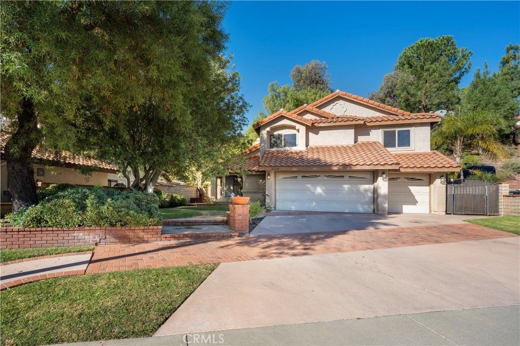 Photo of 25019 Coriander Ct, Stevenson Ranch, CA 91381 (MLS # SR25245211)