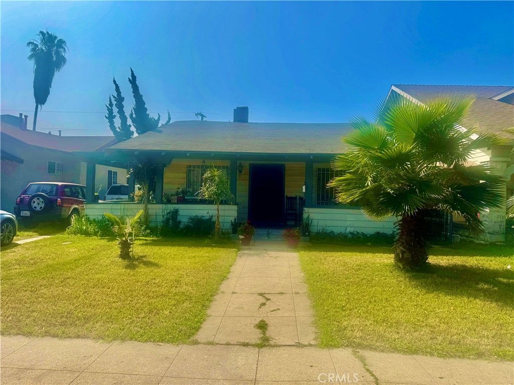 Photo of 1564 W 46th St, Los Angeles, CA 90062 (MLS # IN26073787)