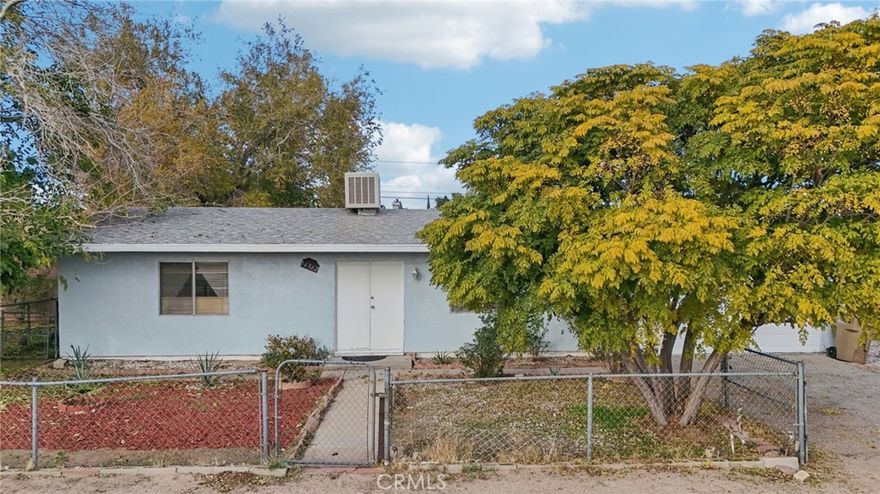 Welcome to this charming 2-bedroom, 1-bath home conveniently located in the heart of Hesperia. Just minutes from the 15 Freeway, shopping centers, and local dining, this home offers both comfort and accessibility. Step inside to find bright, open living spaces filled with natural light and tile flooring throughout. The inviting kitchen provides great counter space and cabinetry for everyday cooking and entertaining. Both bedrooms are well-sized and versatile—perfect for rest, work, or guests. The bathroom is clean and functional, ready for your personal touch. Outside, you’ll find a spacious front and back yard that serve as a true open canvas—whether you envision a garden, patio, or play area, the possibilities are endless. Enjoy the combination of location, potential, and charm that this Hesperia gem has to offer. Don’t miss your chance to make it yours—schedule a viewing today!