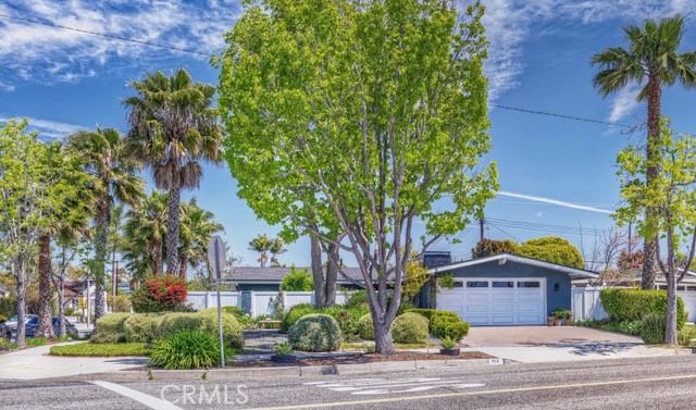 Elegant Single Level Mid-Century Masterpiece situated on Large Corner Lot with Private Pool, Solar System and Direct Access Two Car Garage in the Coveted College Park neighborhood of Costa Mesa. Meticulously Maintained Property masterfully blends timeless architecture with Old World charm. Main Living Room is reminiscent of an Italian Villa with vaulted ceilings, designer paint, travertine flooring, antique chandelier, fireplace, recessed lighting and large sliding glass doors with access to an Outdoor Oasis with Private Pool, Vinyl Fencing, Updated Pavers and Covered Patio. Converted forth bedroom can be used as a Formal Dining Room or Cozy Den/Family Room. Everyday living is a joy in this eat-in kitchen with granite counters, travertine flooring, recessed lighting, convenient center island and charming antique chandelier. Luxurious Primary Bedroom features wood flooring, generous closet space and an en-suite bathroom with recently up-dated walk-in shower, and dual vanity with custom cabinetry. The home has two more generous secondary bedrooms and hall bathroom with shower-in-bathtub. Professionally landscaped iron gated enclosed front courtyard has a large circular fountain with paver walk-way leading to an Exquisite Custom Lead Glass Front Door. Backyard offers ample space for entertaining and relaxation in your private retreat where you can enjoy swimming and Al-Fresco dining. Property has a 15 Panel/Sunpower Solar System installed in 2015, newer tankless waterheater and a newer Roof installed in 2020.
This is all about Convenience and an Elevated Lifestyle - Top-rated schools and Universities, parks, golf courses, O.C. Fairgrounds with weekly Farmers Market, World-Class shopping experiences at South Coast Plaza & Fashion Island, endless Restaurants and Entertainment Venues along with easy freeway access for seamless travel throughout Orange County. Only five minuets from the Pacific Ocean's Huntington and Newport Beaches.
Truly an incredible opportunity to live in one of Southern California's most sought-after communities.