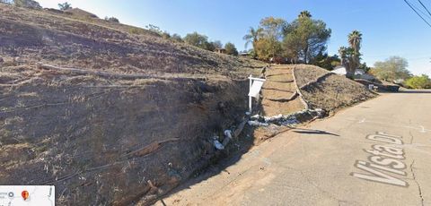 Photo of 9351 Vista Drive, Spring Valley, CA 91977 (MLS # PTP2602905)