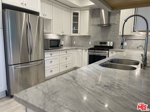 Photo of 1654 Greenfield Avenue #101, Los Angeles, CA 90025 (MLS # 26834115)