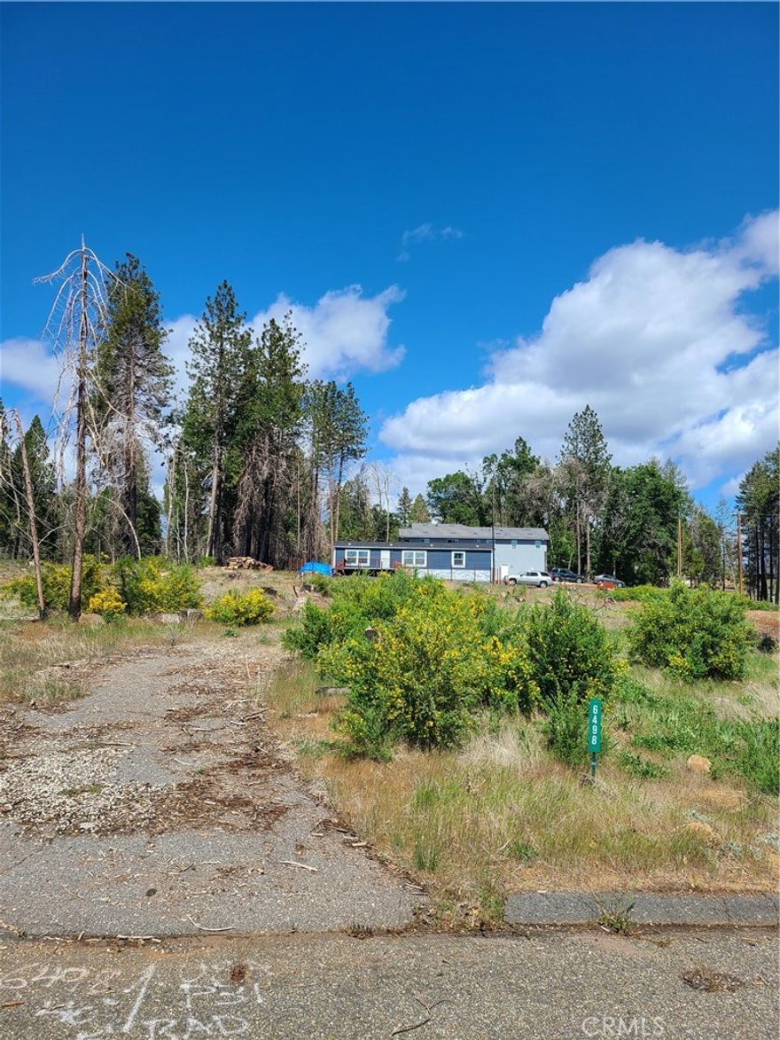 Currently 3 lots available side by side.  Seller will prefer to accept a price for all 3 lots.  Corner of Tulsa Ct and Shaw Circle.  Lots have been cleared of fire debri and certified.  They are ready to put new homes on them.  Water and septic system on site, with power available.  Manufactured homes were there before fire.  Edge of snow line. paved roads.