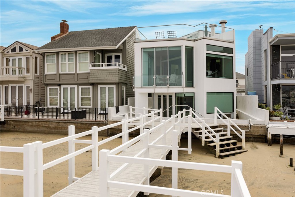 Live the Bayfront Dream in Newport Beach!
Wake up every day to the soothing sounds of the water and the sunshine dancing across the bay—welcome to your ultimate coastal escape! This stunning 3-bedroom, 4-bathroom home is perched right on the bay in beautiful Newport Beach and offers 3,400 square feet of modern, sun-soaked living.bDesigned with both relaxation and entertaining in mind, this spacious retreat features large windows that flood the home with natural light and frame peaceful water views from nearly every room. Slide open the doors and step out onto your private sun deck—complete with tables and chairs, a BBQ grill, and plenty of room to lounge, dine, and entertain as the boats glide by. Calling all boating lovers! A private dock awaits you, with room for two vessels between 25 to 35 feet—just imagine the sunset cruises and weekend adventures! Inside, you’ll find sleek, modern finishes, an open-concept layout, and stylish, comfortable furnishings (or bring your own to make it feel like home). Whether you're hosting friends or enjoying a quiet night in, this space adapts perfectly to your lifestyle. Want to explore the area? You're just steps away from everything the Newport Peninsula has to offer: biking along the coast, shopping at Lido Marina Village, riding the Balboa Ferry, and making memories at the Balboa Fun Zone. Plus, the beach is practically your backyard. With a secure front gate, a roomy two-car garage, and a location that’s truly second to none, this is your chance to experience the California dream—whether for a summer escape or year-round luxury living.
Don’t miss out on this rare bayfront lease opportunity—paradise is calling!