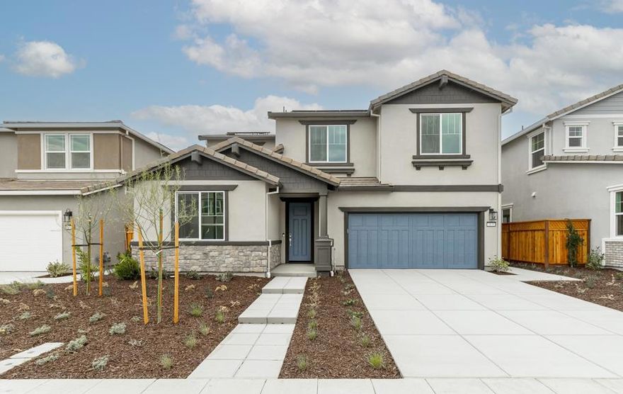 Welcome to The Knolls at Mountain House, a new neighborhood of thoughtfully designed single-family detached homes by Tri Pointe Homes. This spacious 4-bedroom, 3-bath Plan 1 residence offers 2,400 sq. ft. of modern living with an open-concept layout ideal for everyday life and entertaining. The gourmet kitchen features quartz countertops, a large island with sink, stainless steel appliances, and a generous walk-in pantry, all flowing seamlessly into the dining and family room spaces. The first floor includes a bedroom and full bath, perfect for guests or multigenerational living. Upstairs, enjoy an additional loft, well-placed secondary bedrooms, and a convenient laundry room. The primary suite offers a retreat of its own with a spacious walk-in closet and a beautifully appointed bath with a large shower and dual sinks. Energy-efficient features include solar power, multi-zone HVAC, insulated walls, double-pane windows, and low-flow fixtures.  Ideally located in Mountain House, The Knolls offers access to nearby parks, greenbelts, and walking trails, with quick connections to Grant Line Road, Mountain House Parkway, and I-205, creating an easy route to Tracy, Livermore, and broader Bay Area destinations.