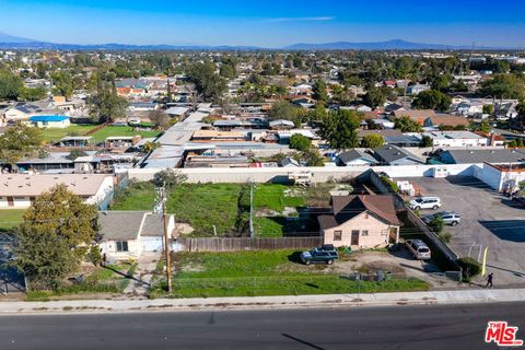 Photo of 1230 S Wilmington Avenue, Compton, CA 90220 (MLS # 25627033)