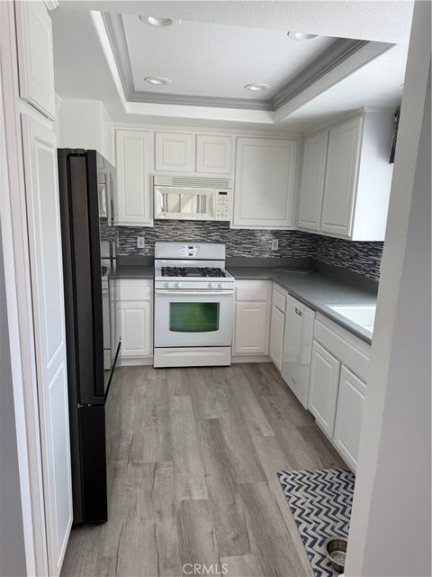 Photo of 8565 Trinity Cir, Huntington Beach, CA 92646 (MLS # OC25237301)