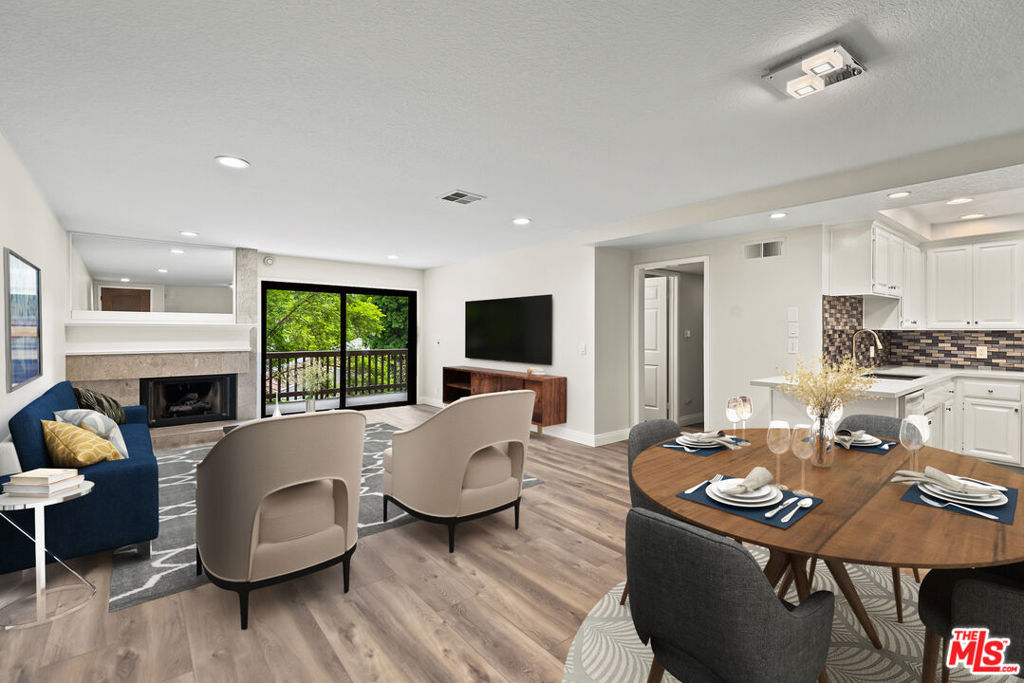 Come experience the laid back beach lifestyle in one of Playa Del Rey's nicest resort communities. This remodeled upper level condo has a large open floor plan with new plank wood-look flooring and gas fireplace looking out to tree lined balcony. Redone kitchen with quartz countertops and designer backsplash. Primary bedroom w/sliders leads out to large quiet balcony. Primary bath with designer hardware and tiles. Stackable in-unit washer/dryer in redone 2nd bathroom. Villas Del Rey is a resort-like complex with two tennis courts, heated pool, outdoor spas, two tandem parking spaces, extra storage, fitness room, sauna, social/rec room and more. Not far from the beach and the best restaurants in the area. It's all happening in Playa... **GUEST PARKING AT 8130 MANCHESTER across from YumYum DoNuts. Please use Manchester entrance.**.