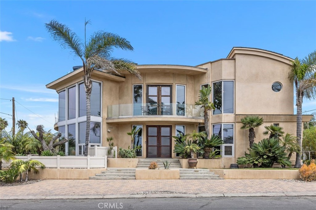 Welcome to 5390 Carlsbad Boulevard! This spectacular three-story oceanfront retreat seamlessly blends modern luxury with the relaxed charm of coastal living. Perfectly situated across from the premier surf at Terramar Beach, this stunning home offers sweeping, unobstructed ocean views from nearly every room. Designed for both entertaining and everyday comfort, the open-concept layout is filled with natural light, soaring ceilings, multiple ocean-view balconies, and premium finishes throughout. The expansive rooftop deck is a true showstopper, featuring an outdoor kitchen, turf area, and spa making an ideal private oasis to enjoy panoramic sunsets and the soothing sounds of the ocean. The flexible floor plan offers spacious living areas, a gourmet chef’s kitchen, luxurious bedroom suites, and versatile guest quarters on the subterranean level, perfect for visitors, a home theater, or a private office. The elevator services all levels, from the four-car subterranean garage to the rooftop deck, ensuring convenience and accessibility. Smart home features and timeless coastal elegance complete this extraordinary residence. Enjoy Carlsbad’s best beach lifestyle with direct access to the home and garage from Cerezo Drive.