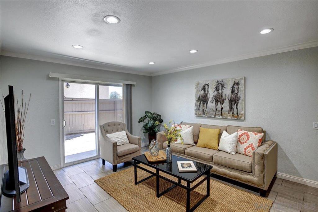 Fully upgraded 2-bed/2-bath downstairs condo inside the gated community of Sun Ridge. Upgraded features include tile floors in kitchen, dining room, living room and bathrooms; laminated wood floors in both bedrooms; slab granite countertops in kitchen and 2 bathrooms; stainless appliances; LED ceiling recessed lights in living room; ceiling fans in both bedrooms; Stainless appliances & central HVAC system; large backyard for a pet or entertaining family. This lovely condo is near shopping, school, Freeway CA-78 & I-15 access, Costco & Palomar Hospital. It is a great property for a small family or investor pursuing high rental income. Complex Features: , Equipment: Dryer, Washer Sewer: Sewer Connected Topography: LL