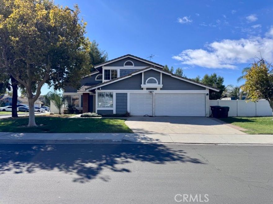 Welcome Home! This beautifully renovated two story home in Moreno Valley offers 3 bedrooms, 3 bathrooms, and plenty of space to live, relax, and entertain. Situated on a spacious corner lot, the property features a lush, oversized front yard and an attached two car garage with additional extra-spacious storage area. Enter inside to find a bright and welcoming interior with fresh paint throughout, soaring ceilings, and a thoughtfully designed layout. The main floor boasts durable tile flooring and a spacious living area perfect for gatherings. The fully remodeled kitchen is a standout, featuring brand-new cabinets, countertops, sink, faucet, and vent hood. Each bathroom has been tastefully updated. The downstairs bathroom features a new vanity, countertops, sink, faucet, and a sleek new shower. Upstairs, both bathrooms have been upgraded with new vanities, countertops, sinks, and faucets. Upstairs, you'll find all three bedrooms along with additional hallway storage. The spacious primary suite includes two closets and a private ensuite bath with dual sinks and a shower/tub combo. New luxury vinyl plank flooring has been installed throughout the upper level, and the staircase has been updated with plush new carpeting for added comfort.The laundry area is located in the garage and includes a washer and dryer for your convenience. However, please note that these appliances are provided in 'as-is' condition, and the owner is not responsible for their repair or replacement. The expansive backyard provides plenty of room for outdoor activities, gardening, or simply relaxing, offering endless possibilities to make the space your own. Don't miss the opportunity to make this freshly upgraded home your own. Schedule a tour today and experience all it has to offer!