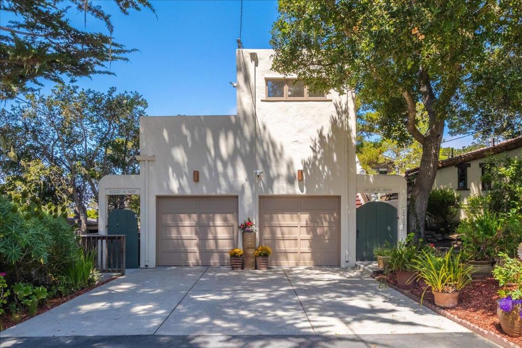 This inviting Carmel duplex is walking distance to town and offers flexible living space and income potential. You can reside in one unit and use 2nd for rental income, caretakers quarters or guest suite- the possibilities are plentiful. The upper unit is bright and airy with 2 bedrooms, 1 bathroom, expansive deck for entertaining, and serene treetop views. The lower unit has 1 bedroom, 1 bathroom and features an open floor plan, front deck, and spacious backyard for gardening or relaxing. Each unit includes a separate garage space. This low maintenance home is ideal for those looking for a "lock and leave" 2nd home, or full time residence with downtown Carmel just a short stroll away.