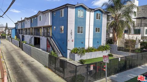 Photo of 1271 W 39th Place, Los Angeles, CA 90037 (MLS # 26653855)