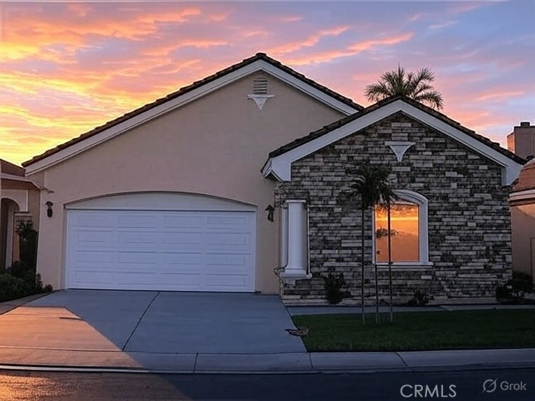 Stunning Indian Palms Country Club home, nestled on the golf course. As you step inside, a seamless blend of stone and greenery welcomes you to an open floorplan, highlighted by a cozy fireplace in the living room. The kitchen, adorned with granite slab countertops and a convenient island/bar, is a delightful space. Abundant natural light bathes the living area, complementing the tile flooring extending throughout, with plush carpeting in the bedrooms. This property includes a 2-car garage and a separate golf cart garage. The master bedroom is a spacious retreat, featuring dual sinks in the master bathroom, a separate walk-in shower, and a soothing soaking tub. A walk-in closet completes the suite. Meticulously designed, this home offers a perfect balance of comfort and sophistication. Indulge in a lifestyle of fun, from entertaining in the open living spaces to enjoying scenic views from your backyard. The residence is short-term rental friendly and within walking distance to Coachella fest. With a 27-hole golf course, gyms/lifestyle center, pickleball, tennis, bocce ball, and 3 pools and spas, it caters to various recreational preferences. The 24-hour guard-gated community ensures security and peace of mind.