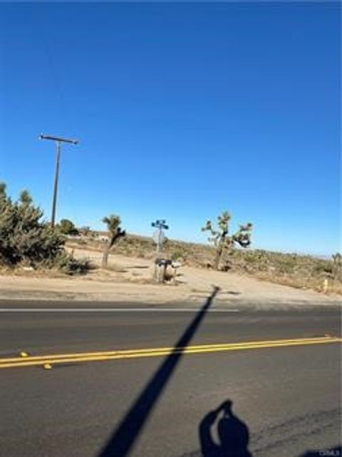 Photo of 57031 Buena Vista Dr, Yucca Valley, CA 92284 (MLS # JT26071123)