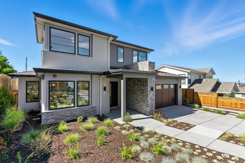 Brand new, quality built executive home with soaring ceilings and an open, light-filled floor plan. The inviting entryway opens to a formal living room and elegant dining room. Paces away the chef's kitchen boasts a butler's pantry with wine fridge, large center island with breakfast bar, and walk-in pantry. Dining area with oversized sliding glass doors that open to back deck and yard. Just steps away, the spacious family room offers a cozy fireplace ideal for everyday living or entertaining. A ground-floor en-suite with provides flexible living options, while a well-appointed mudroom/laundry room and a stylish half-bath round out this level. Upstairs, the luxurious primary suite features spectacular bay views is a true retreat, complete with a spa-like bathroom. Two additional bedrooms share a full hall bath. The expansive backyard is a blank canvas, ready for your personal touch perfect for creating your dream outdoor oasis. Conveniently located near parks, hiking trails, restaurants and shops with close proximity to major streamlined commute routes!