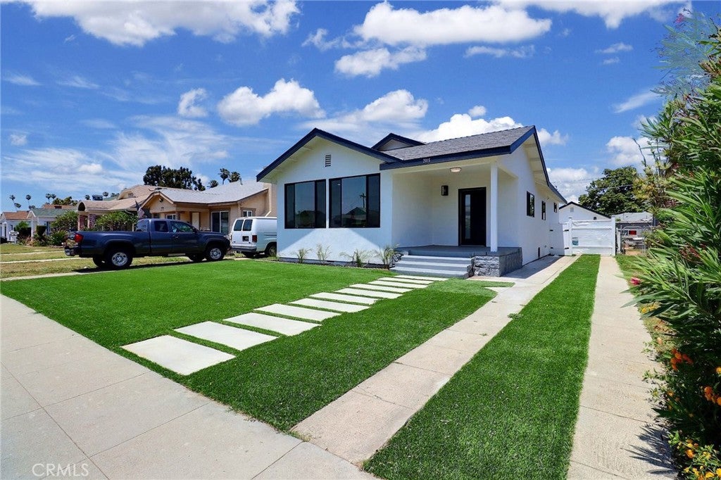 Photo of 2015 W 42nd Place, Los Angeles, CA 90062 (MLS # IV26149300)