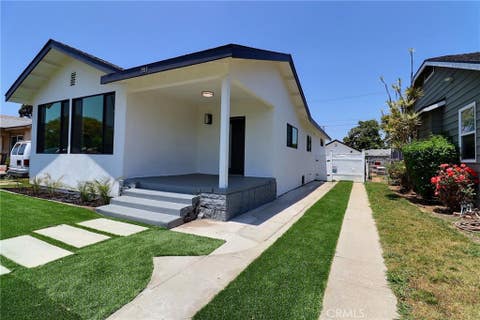 Photo of 2015 W 42nd Place, Los Angeles, CA 90062 (MLS # IV26149300)