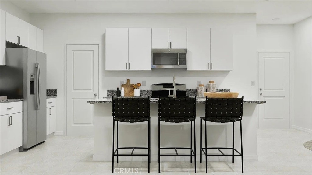 NEW CONSTRUCTION! This new two-story home is ready for the way people live today. An open-concept layout on the first floor offers seamless entertaining and multitasking. On the second floor, an inviting loft provides a shared living area easily accessible from three bedrooms, including the lavish owner’s suite with a full bathroom and walk-in closet.
Tailwind is a new collection of single-family homes at the Renaissance masterplan, now selling in Rialto, CA. This gated community offers fantastic onsite amenities, including a relaxing swimming pool, playground, dog park, tot lot and much more. Homeowners will be a short drive from shopping, dining and entertainment at the Renaissance Marketplace. Renaissance boasts a prime location near the I-210 and I-15 freeways, providing easy commutes to Los Angeles, San Bernardino and other surrounding areas. The community is conveniently located near top universities such as California State University, San Bernardino (CSUSB) and the University of California, Riverside (UCR), offering excellent opportunities for higher education.