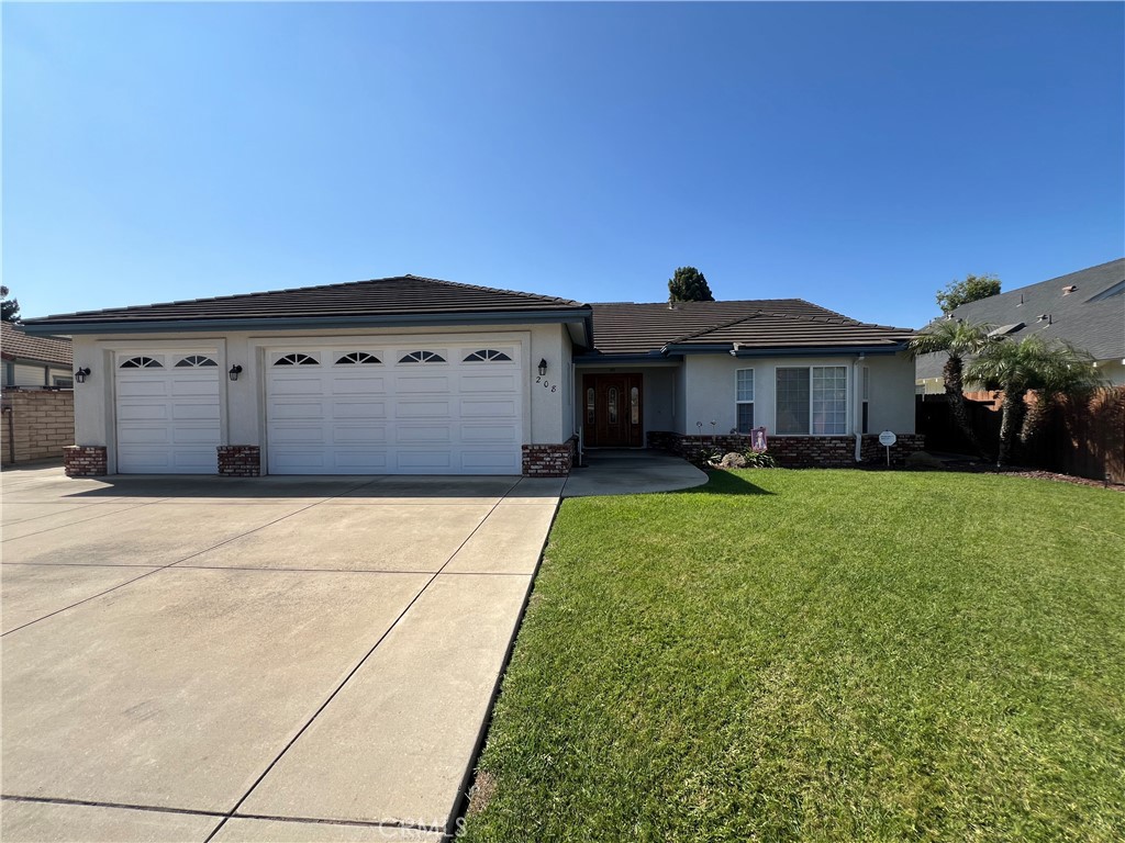 Custom Moro Estate built home in a well maintained neighborhood with a spacious 3 bedroom possibly 4th bedroom, 2.5 bath, 3 car garage, 1872 sq. ft. one level home in a quiet family neighborhood. Property includes a large 7,405 sq. ft. lot Plenty of parking including for RV as well. Front and backyards are nicely landscaped and include an irrigation system. There is also a storage shed in the backyard perfect for the lawnmower, tools anf gardening supplies. This home has an inviting, recently serviced gas, brick fireplace with a remote control, with a nice hearth for seating. There is a sitting area with recessed lighting along with an open floor plan that includes a family and dining room along the kitchen with a bar area for extra seating. There is a small closet right inside the entryway, perfect for hanging your coats after coming home or for company. The 3 bedrooms includes spacious closets, the master bedroom features a walk in. The master bath also includes a jetted spa tub and has a ladder built into the ceiling for added storage in the attic. The bedrooms all include overhead ceilings fans for warm days. The garage includes a brand new water heater and laundry hookups as well as an upgrade to the 3rd bay garage door opener. Recessed lighting and high ceilings add to the spaciousness family room. Natural light abounds in this charming home. See this home today before it sells.