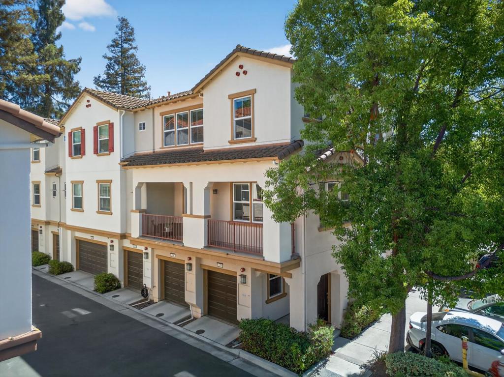 Bright, peaceful living at 670 Grandview Terrace. Spacious 3B/2.5B corner-unit townhome style living blends modern comfort & natural serenity, w/sunlight streaming through mature trees for brightness & privacy. High ceilings, generous balcony for relaxing/entertaining. Low $260/mo HOA incl. water=value & ease of living. Built 2009 by Trumark Homes in N. San Joses sought-after Berryessa, w/stylish updates: refinished hardwood, new carpet, freshly painted cabinets/vanities, touch-up paint, steam-cleaned tile. Open layout features large dining area + sit-up kitchen bar. Indoor laundry on main (2nd-story) living floor; spacious 2-car tandem garage for parking/storage. Walk to light rail, mins to Berryessa BART. Direct access to Penitencia Creek Trail leading to Alum Rock Park in the Diablo Range-ideal for hiking, biking, or unwinding among oak woodlands & sweeping views. Close to shopping, dining, major Fwys, & top tech employers incl. Tesla, Google, Apple N. SJ campus. A turnkey, move-in-ready home in a well-connected, nature-adjacent community.