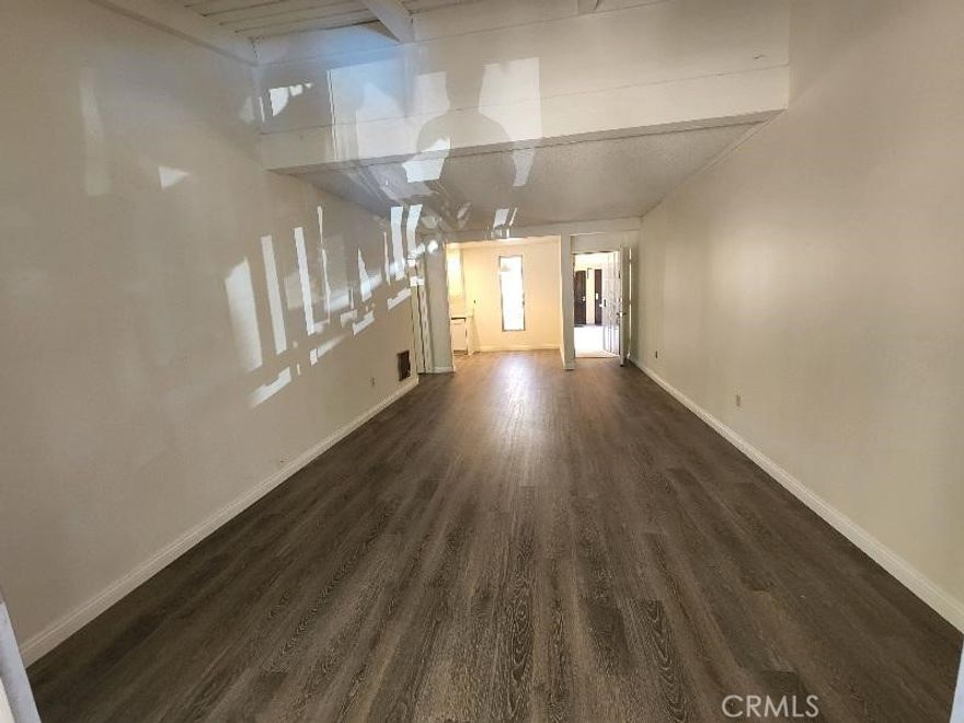 Model Like Remodeled South Coast Metro Area One Bedroom Condo in the Macarthur Village community . Features include ; Choice Upper Location with nice view of the neighborhood , Hardwood Style Vinyl Plank Flooring throughout , largest 1 bd floorplan in the community - aprx 740 sq ft , kitchen has white cabinets / stainless electric range / white quartz counters / dw , bath has a tiled walk in shower with bench & frameless door , bedroom has a walk in closet , living room has vaulted ceilings & balcony , dining area ,  parking consists of one carport with storage locker / 2 nd car unassigned uncovered space , gas / water / trash / gardener / sewer paid ,  ac / heat , 24 hour guard gated Macarthur Village community offers pickleball / 5 pools & spa areas / laundry rooms / 4 tennis courts / gym / clubhouse / barbeque & picnic areas / basketball court . One block to South Coast Plaza / Segerstrom Center / movies / coffee shops / world class fine dining & shopping  , close to the 405 / 55 / 73 / & 5 freeways / John Wayne Airport  , short drive to Newport & Huntington beaches