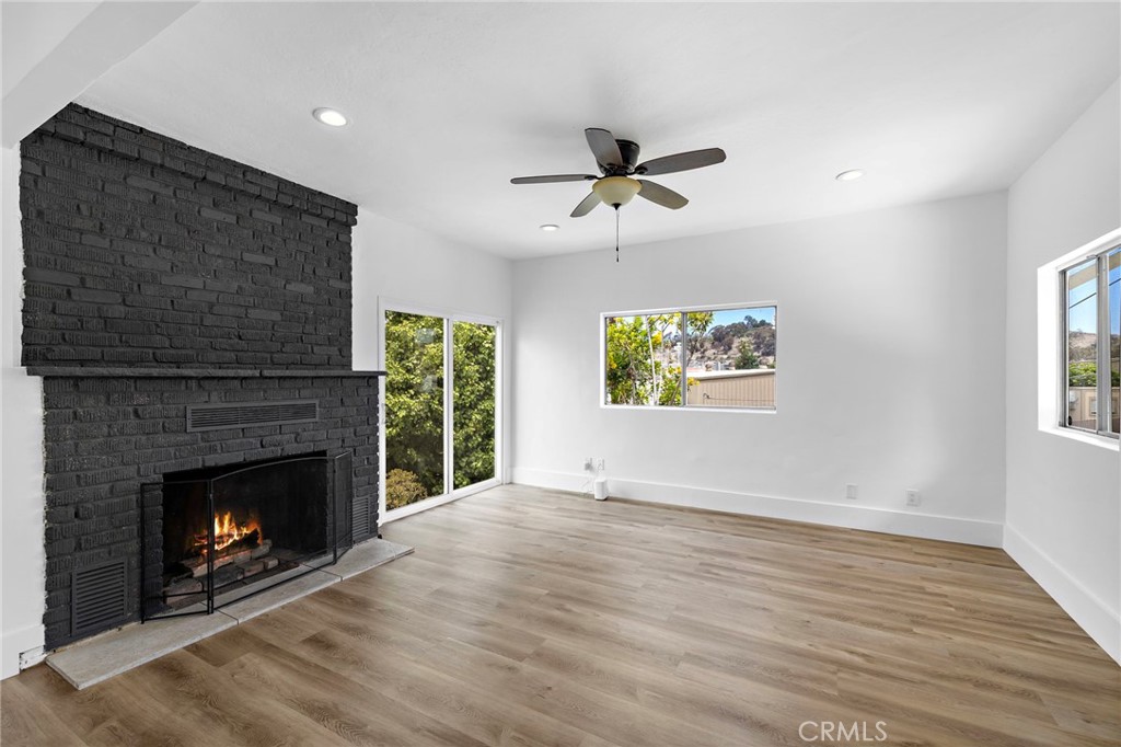 Step into the charm of this beautifully updated 3-bedroom, 2-bath single-family home, ideally located near the beach, shops, restaurants, and vibrant downtown living. Originally built in 1928, this home blends timeless character with modern comfort. Inside, you'll find luxury vinyl flooring throughout, freshly painted interiors, and a bright, upgraded kitchen featuring granite countertops. Whether you're looking for a full-time residence, vacation getaway, or investment opportunity, this home offers endless possibilities. Don’t miss the chance to own a piece of history in a location that has it all. Perfect for investors or first time home buyers!