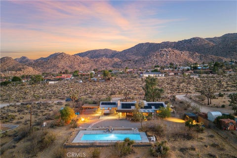 Photo of 61184 Onaga Trail, Joshua Tree, CA 92252 (MLS # JT26203295)