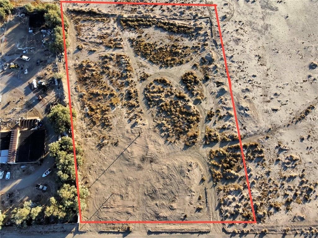 This 2.6-acre, flat and usable lot sits on a quiet paved country road with easy access and plenty of space to build. It's perfect for a small development, custom home, or weekend getaway. Enjoy wide-open desert landscapes and stunning mountain views in every direction—peaceful, private, and full of potential. With over 113,000 square feet of land, there’s room for multiple structures, outdoor living, or even a hobby farm. Whether you're looking to invest or create your own space to spread out, this property offers a rare mix of beauty and flexibility.