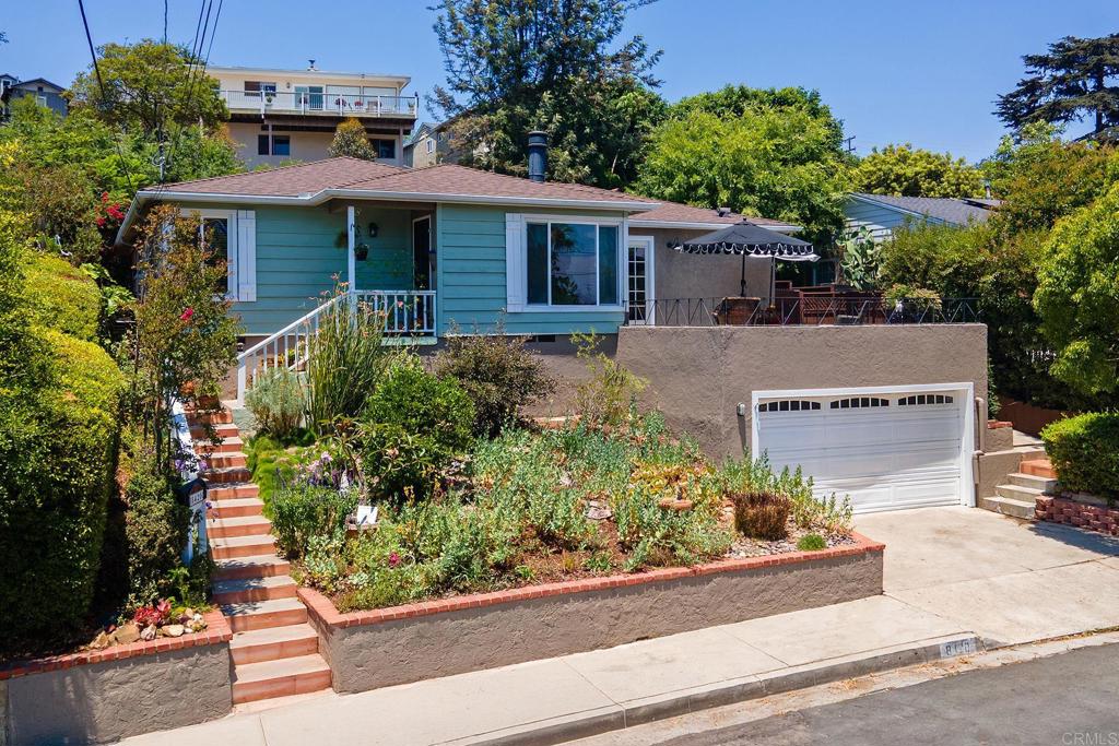 Rare Opportunity in La Mesa’s Historic Porter Hill! Named after local pioneer, Dr. Henry Porter (1845-1916), discover timeless charm in one of La Mesa’s most sought-after neighborhoods. The home is situated near the end of the Terrace on the elevated view side, which terminates in a quiet cul-de-sac with paved access path to 22-acre MacArthur Park, just steps from your front door. The park features a dog park, community pool, recreation center, historic Nan Couts Cottage, ball field, and children’s playground. Next, take a short stroll into La Mesa Village to enjoy year-round community events, charming local eateries, boutique shops, galleries, and more. Lovingly maintained and thoughtfully updated, this character-rich gem combines vintage appeal with modern convenience. The remodeled kitchen features solid maple cabinetry, striking polished granite countertops, tile flooring, and brand-new GE and Frigidaire appliances. Natural light fills the home via an abundance of windows and French doors, highlighting the rich oak hardwood floors throughout in all but the beautifully remodeled bathrooms. The primary suite is a spacious retreat with a gorgeously tiled full bathroom, expansive closet space & dual French doors to the back yard! Bedroom 2 is also surprisingly large with an ample 10 ft wide closet and charm galore. Bedroom #3 is currently an office/lounge but has a closet and can easily convert back to a bedroom. I love the vintage interior doors! Comfort is year-round thanks to the 2021 HVAC system and ventwork. Upgrades also include dual-pane windows, fresh interior paint, and ample recessed lighting throughout. (See attached amenities list for full details.) Step outside the dining area to enjoy a spacious view deck and beautifully landscaped, award-winning gardens (recipient of the 2017 La Mesa Beautiful Award). The backyard is a gardener's dream offering shaded peace under the covered patio & alfresco dining area, ample lawn, whimsical seating areas, potting table area &vibrant water-wise plantings—Homes in this historic enclave rarely come on the market—this one hasn’t been available in over 40 years. Don’t miss this extraordinary opportunity to own a piece of La Mesa’s rich history in an unbeatable location.