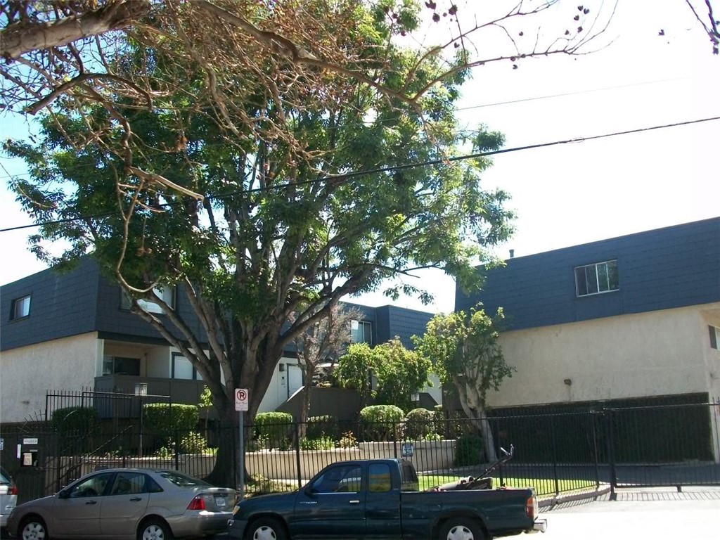 Welcome to this amazing townhome in prime Tarzana. Features an open living room with a  gas fireplace, half bathroom, and a slider to a private patio. The large kitchen boasts custom cabinets, stainless steel appliances, and beautiful stone countertops, all with modern wood flooring throughout the lower level. Upstairs is a large master suite bedroom with wall-to-wall mirror closets, a coat-style closet, a storage closet, and an updated bathroom.  Downstairs is a utility room with a washer and dryer that leads to a two-car attached garage.  These are the most popular floor plan townhouse in the area.  The complex offers a pool, recreation area, and tennis courts.  Act fast because it will not last long.
