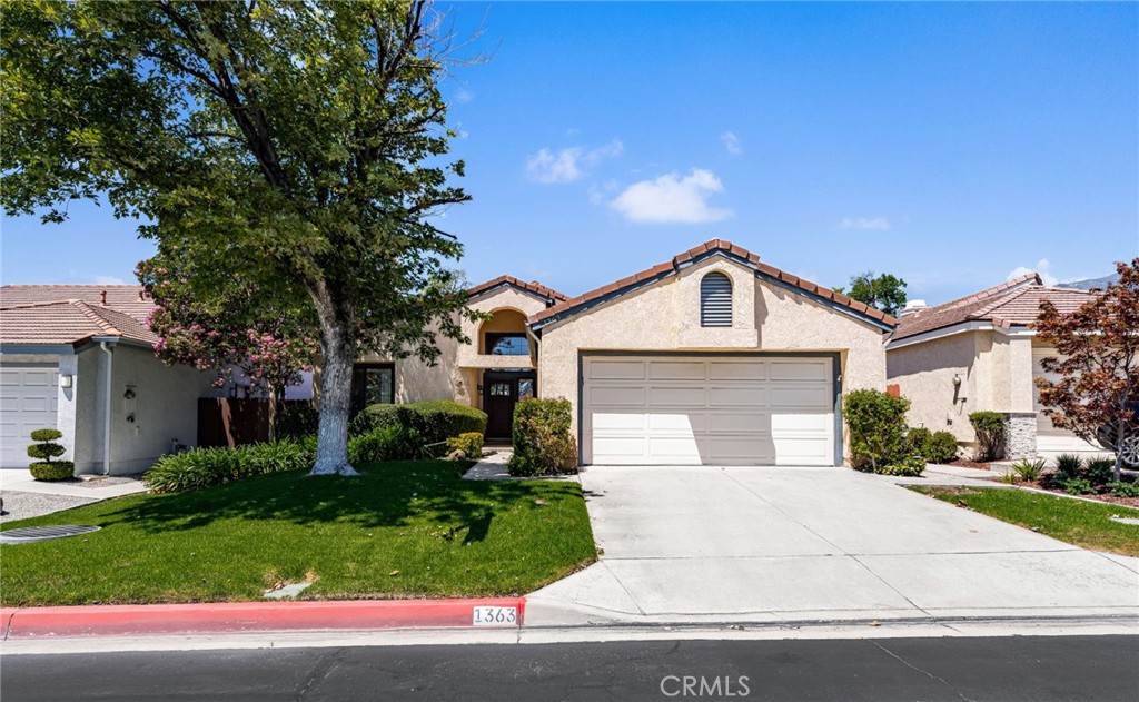 Welcome to this lovely two-bedroom, two-bath home located in the highly desirable gated community of Acacia Park in North Upland. Perfectly positioned to take advantage of the community amenities, residents can enjoy sparkling pools, relaxing spas, and multiple sport courts. Conveniently accessible off Benson Avenue, this home also offers breathtaking mountain views.
Step inside to a warm and inviting living space featuring cathedral ceilings and abundant natural light streaming through picturesque windows. The open design creates a bright and airy atmosphere, making the home feel both spacious and comfortable.
Additional highlights include laminate flooring, upgraded restrooms and kitchen and an oversized attached two-car garage with ample driveway parking, beautifully landscaped grounds, and a charming garden space. The expansive outdoor patio provides the perfect setting for entertaining or simply enjoying cooler evenings under the stars.
This home is a wonderful opportunity to enjoy both comfort and community in a prime accesible Upland location.