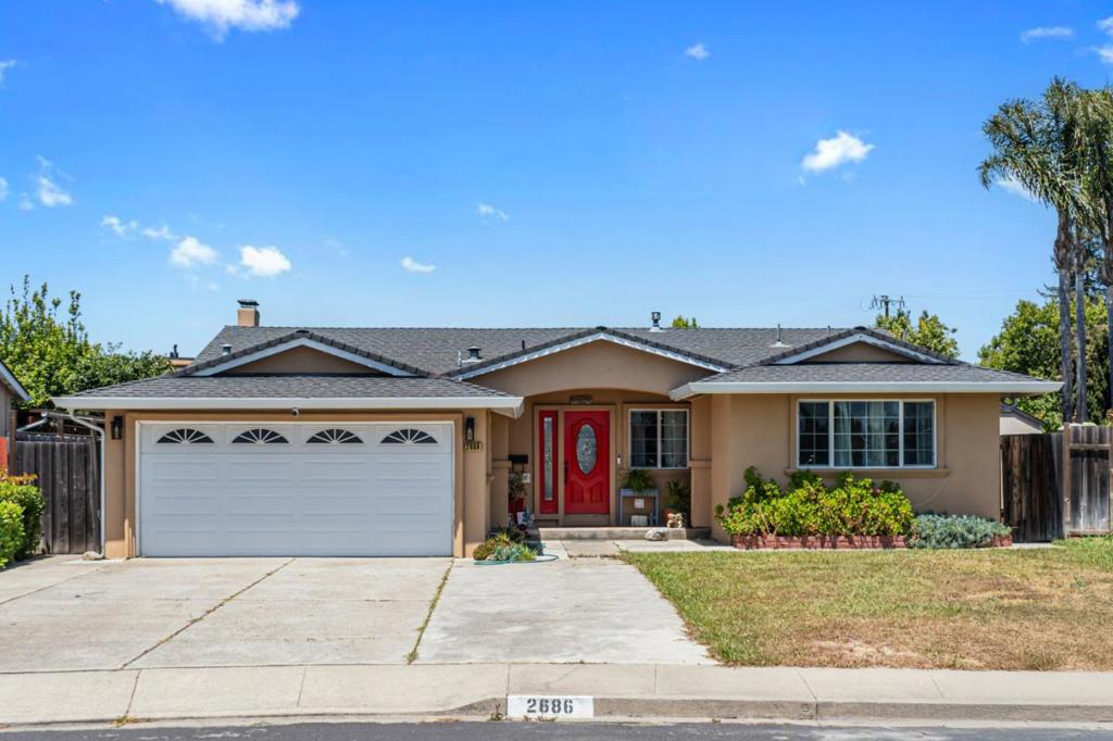 Welcome to this charming 4-bedroom, 2 1/2 bathroom home located in the vibrant city of Union City. Spanning 1,629 square feet, this residence offers a spacious and comfortable living environment. The kitchen is a standout feature, boasting granite countertops and a garbage disposal for convenient meal prep and clean-up. Enjoy meals in the dedicated dining area, while the separate family room provides ample space for relaxation and entertainment. The home features a combination of hardwood floors and tile flooring, catering to both style and practicality. A cozy fireplace adds warmth and ambiance to the living spaces. With the biggest backyard in the neighborhood, perfect for your dream pool, or outdoor retreat. Laundry tasks are made easy with facilities located outside in the garage. The property also includes a two-car garage for secure parking and additional storage. This home is situated within the New Haven Unified School District. Don't miss the opportunity to make this your new home in Union City.