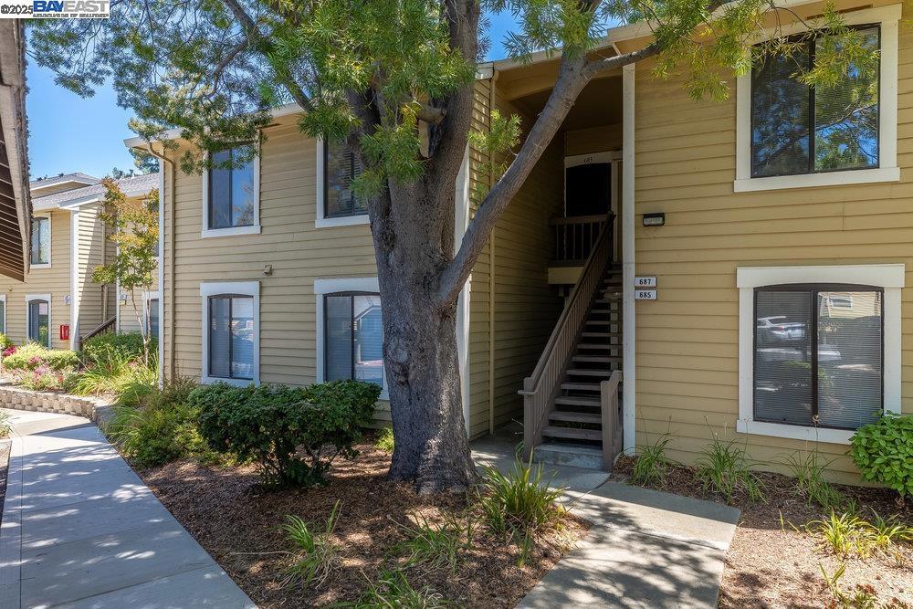 Charming 2-Bedroom Condo in Sought - After Muirwood Square! Welcome to this beautifully updated 2-bedroom, 1-bathroom condo in the serene Muirwood Square community, surrounded by lush trees and close to scenic walking trails. The modern kitchen features quartz countertops, a stylish backsplash, new dishwasher, and recessed lighting that flows into the cozy living room with a snug fireplace and new laminate flooring throughout. Enjoy the convenience of in-unit laundry with a stackable washer and dryer in the bathroom, plus a new water heater for added comfort and efficiency. The well-managed HOA offers a pool, spa, and plenty of guest parking—and covers water, sewer, trash, and exterior maintenance, giving you incredible value. Just two blocks from Muir Station with Nob Hill Foods, Starbucks, and the Contra Costa Stadium Cinema. Easy freeway access makes commuting simple. Don’t miss this opportunity to call this inviting space Home Sweet Home!