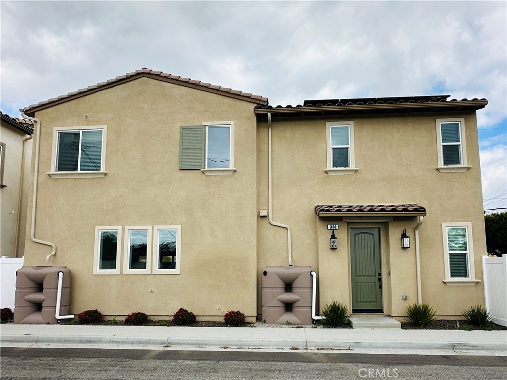 A Must See! Don't miss out this rare opportunity to be the residents of this ONE YEAR OLD HOME located near Old Town Torrance. This two story single house offers 3 bedrooms and 2.5 bathrooms with all the luxury upgrades from the builder as a model home for this newly built South Bay Village. Solar Panels installed to save the planet and your future utility bills. Main entry from the first floor leads to an open kitchen, dinning area, living area, walk-in pantry, powder bathroom and a 2-car garage. All the bedrooms are upstairs to keep your privacy and serenity. 3 bedrooms are connected by a family retreat area, laundry room and a full bathroom. Spacious primary suite includes a main bathroom with dual sinks and a walk-in closet. Modern appliances provided by the builders stay in the house. Paved yard is ready for your outdoor living. Please come to see what this fantastic house has to offer.